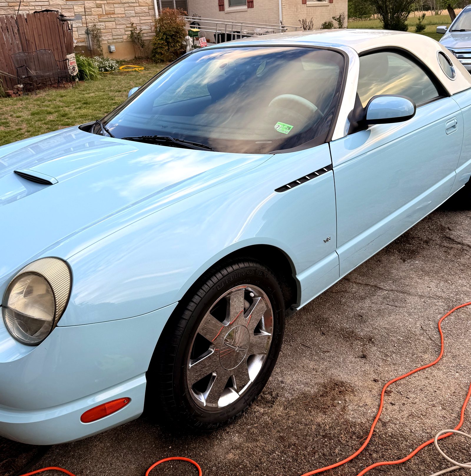 Light blue convertible after an exterior detail
