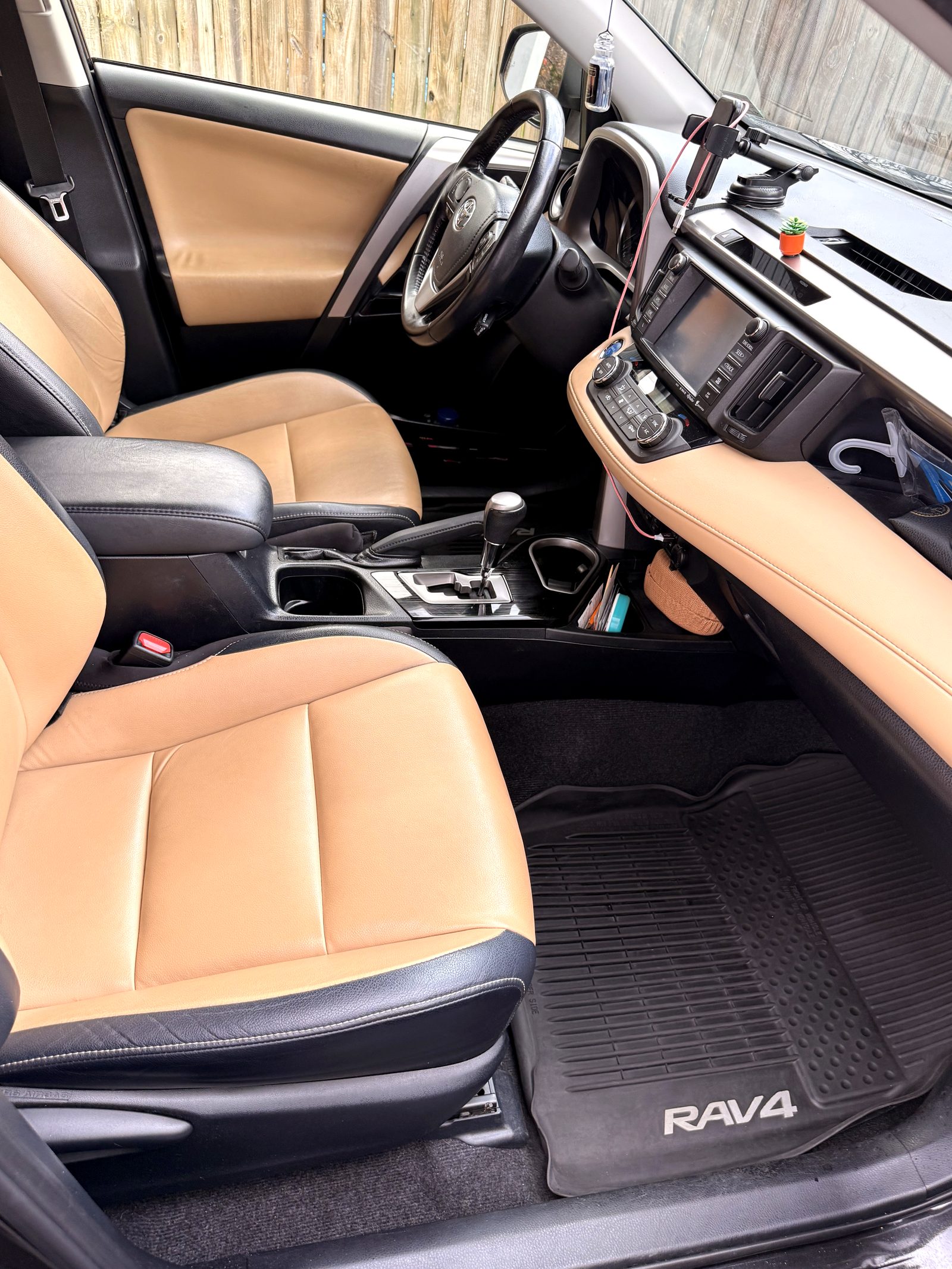 Tan leather Toyota RAV4 interior after detailing
